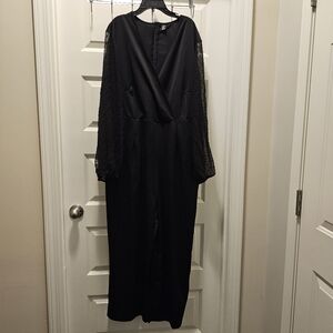 Gorgeous black jumpsuit with beautiful sheer sleeves